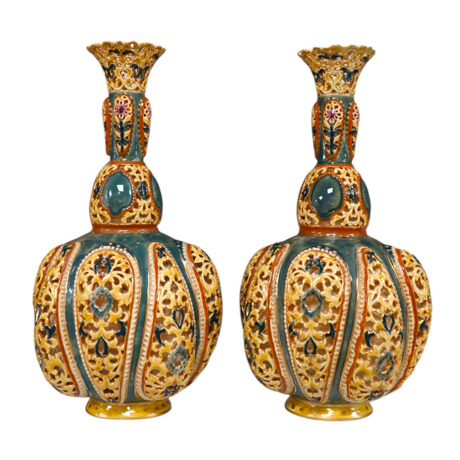 A pair of Zsolnay, Hungarian double walled reticulated vases, 29cm high. Condition - some restoration